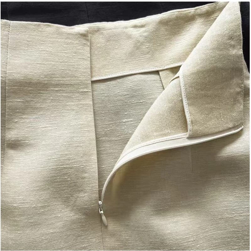 Jupe simple taille haute en lin et laine, atmosphère artistique espagnole, ourlet texturé, fente lat