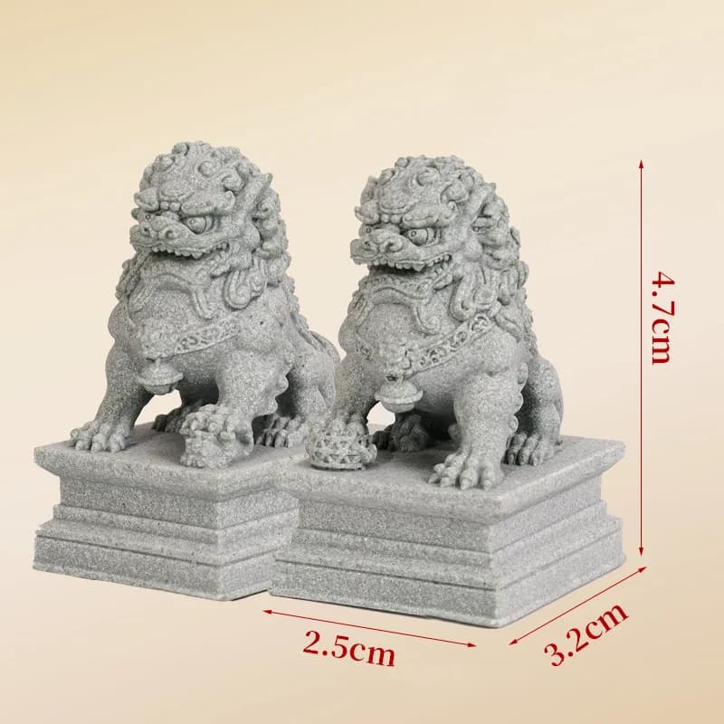 Une paire de sculptures en pierre porte-bonheur et riches de lions, ornements chinois feng shui qili