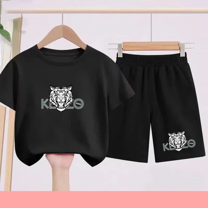 T-shirts d'été noirs et blancs pour enfants, associés à des tenues de sport respirantes et à séchage