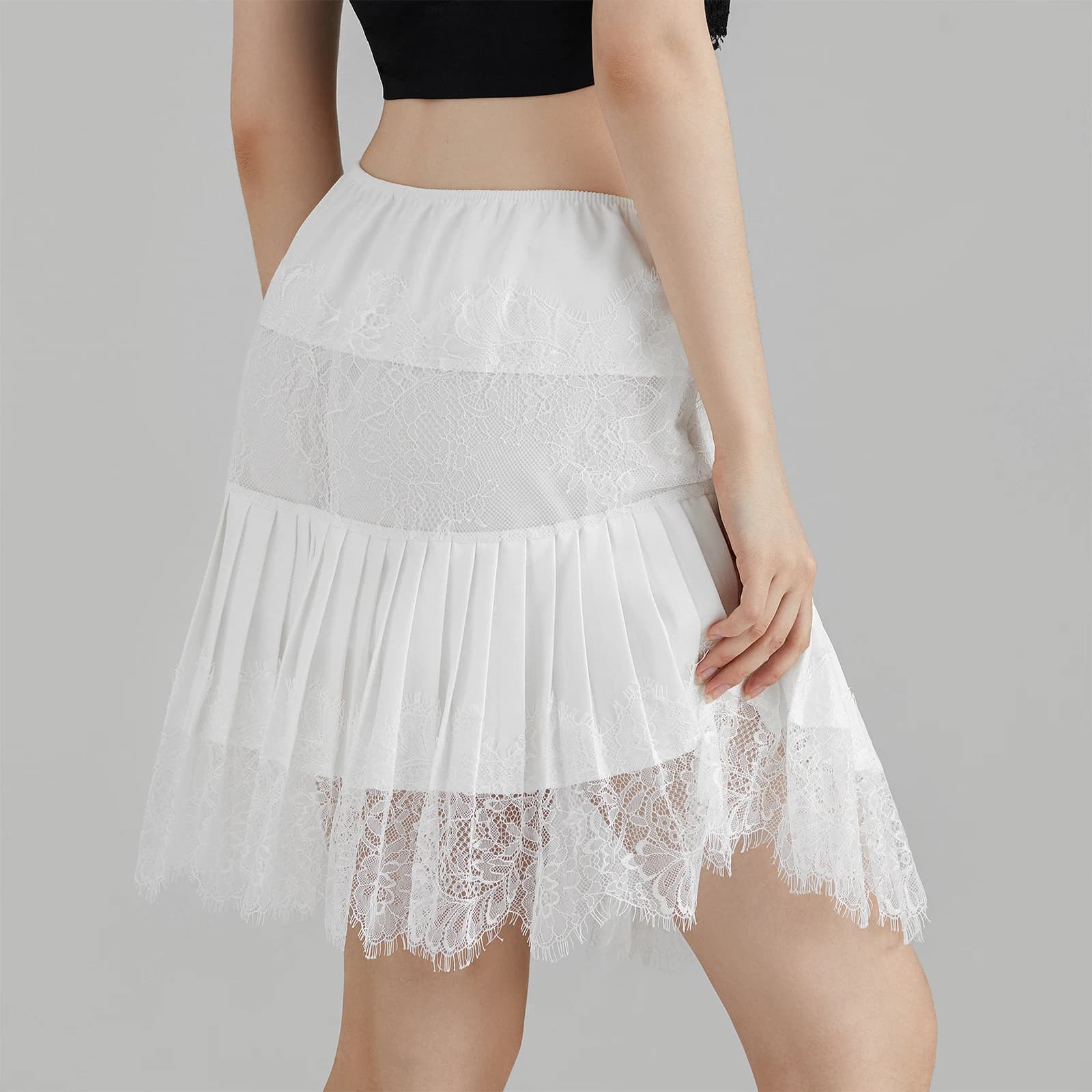 Mode femme couleur unie Mini jupes taille moyenne jupes en dentelle plissée printemps été jupes cour