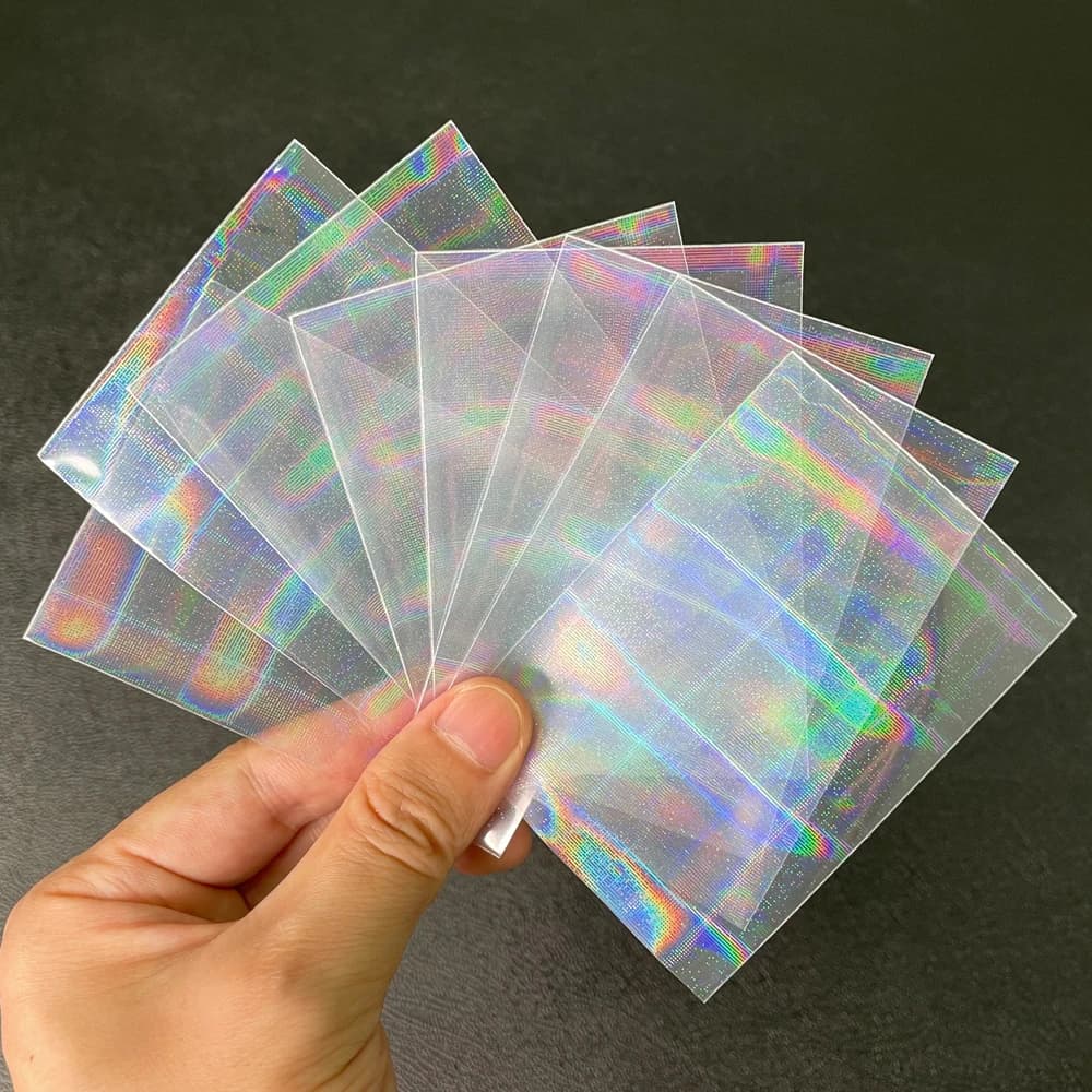 100 pcs/Lot feuille en forme de coeur Laser chargement par le haut TCG manchons de cartes YGO jeu de