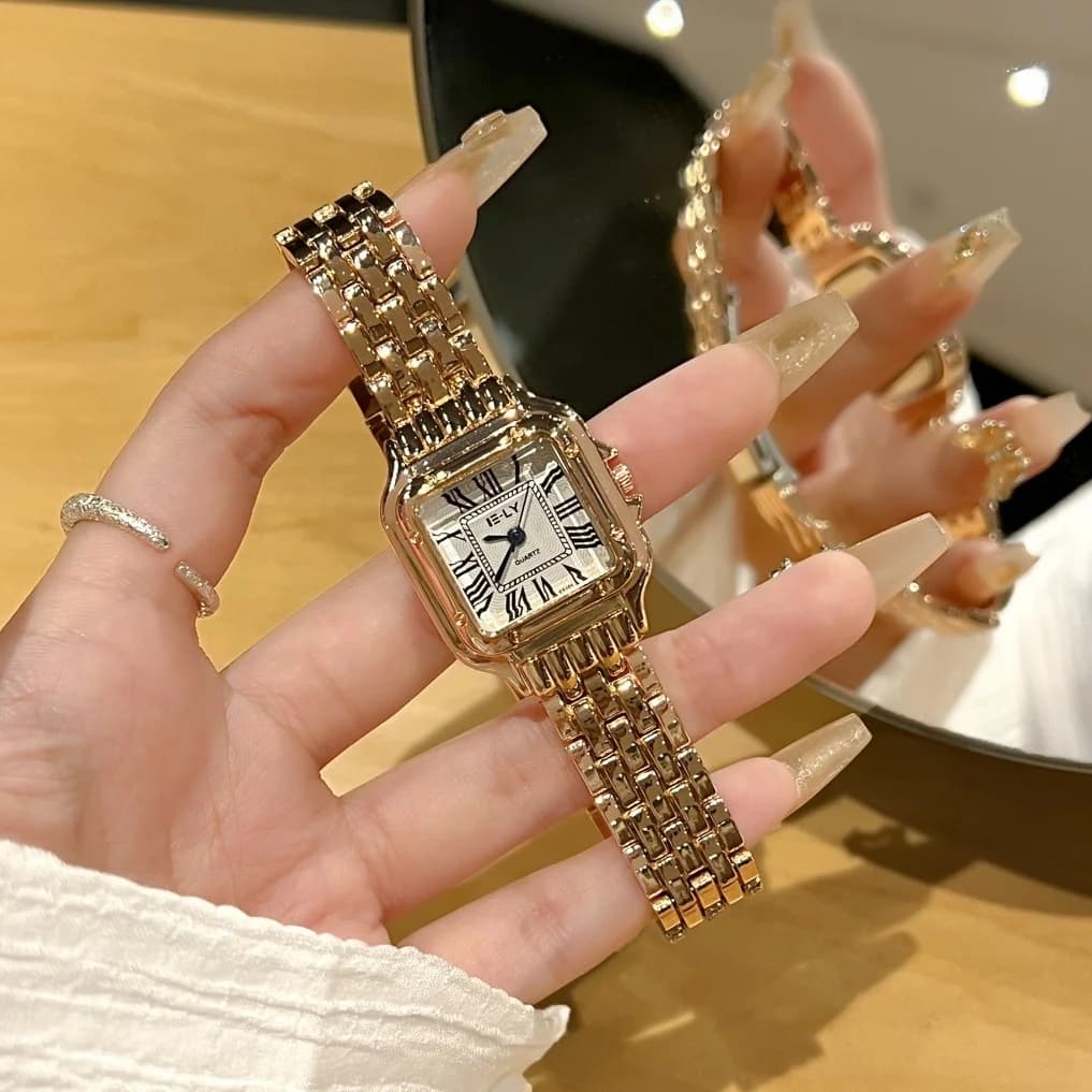 Nouvelles femmes montre lumière marque de luxe affaires or acier inoxydable dames mode montres à Qua