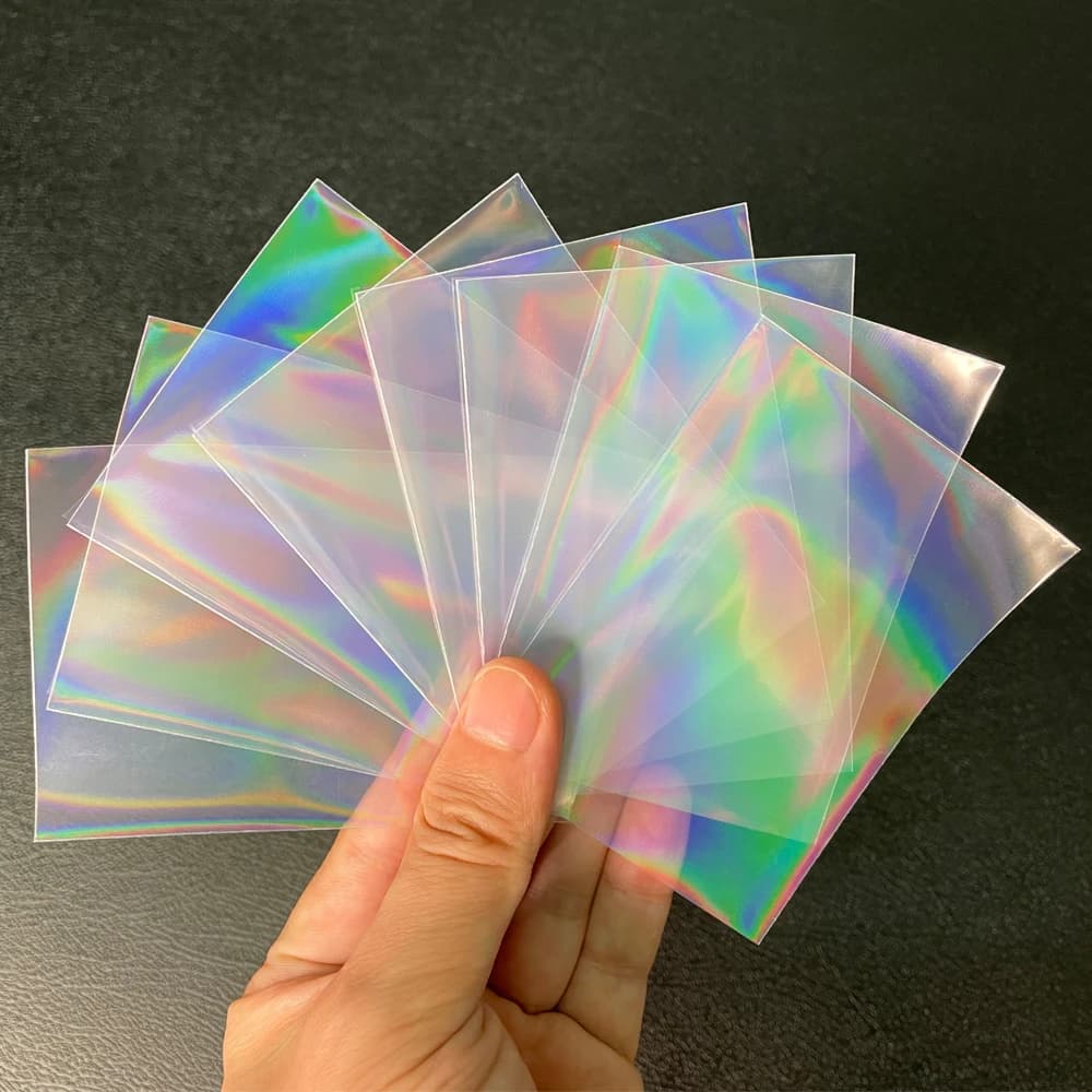 100 pcs/Lot feuille en forme de coeur Laser chargement par le haut TCG manchons de cartes YGO jeu de