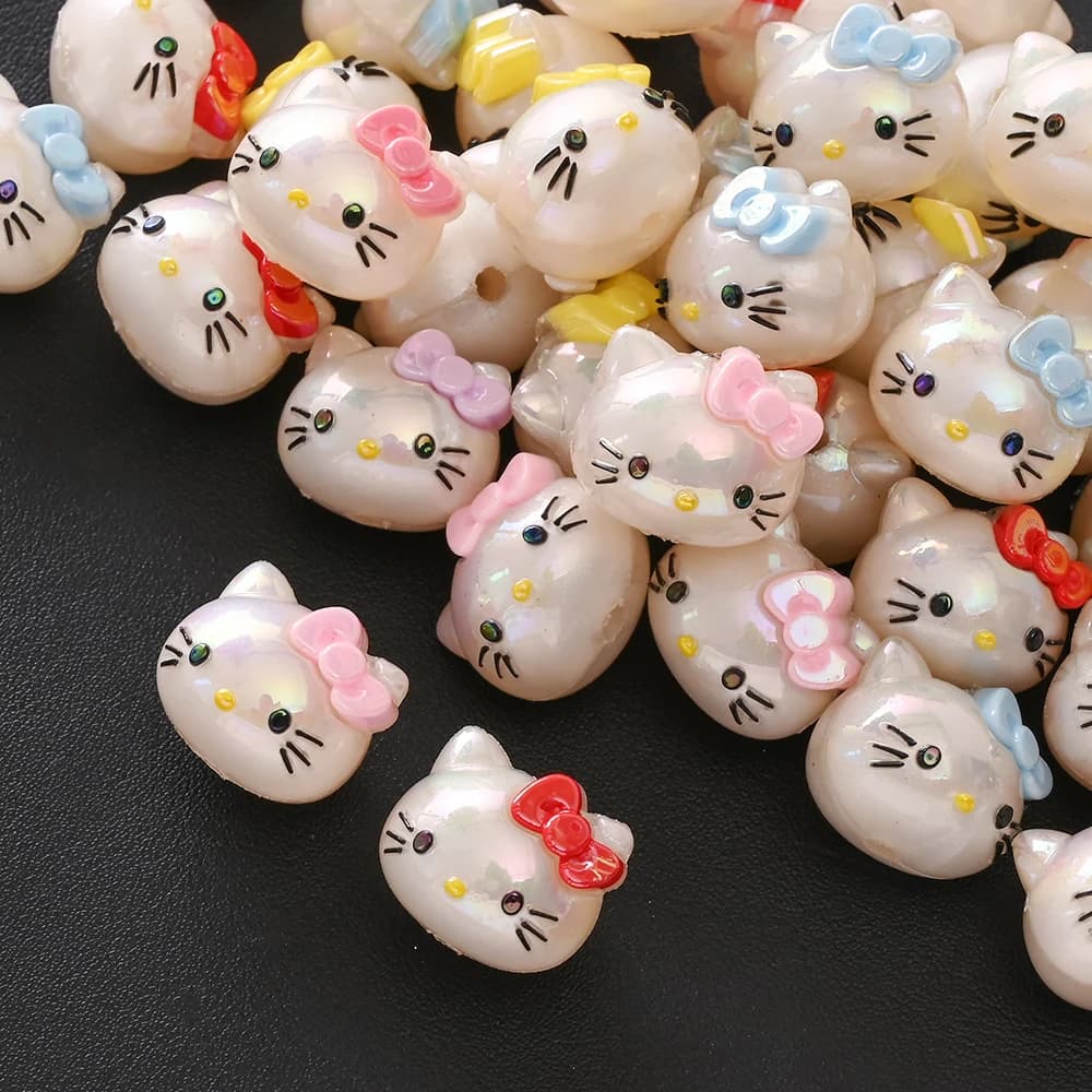 10 pièces mélange aléatoire de perles en résine Hello Kitty tête Focus perle pour bébé dentition suc