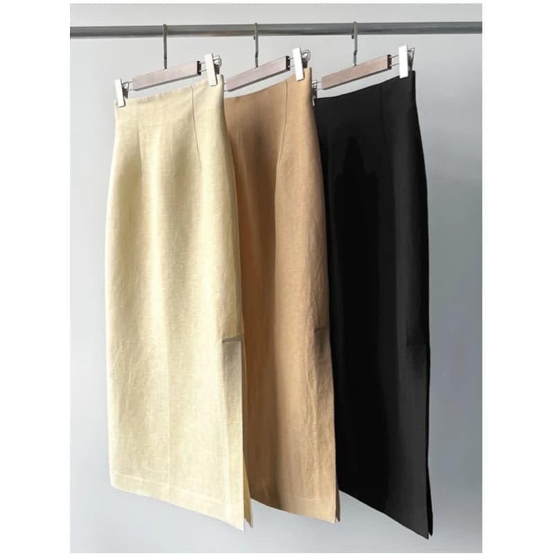 Jupe simple taille haute en lin et laine, atmosphère artistique espagnole, ourlet texturé, fente lat