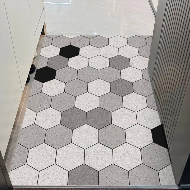 Le tapis de porte d'entrée peut être nettoyé avec un tapis de porte domestique en PVC. Le tapis d'en