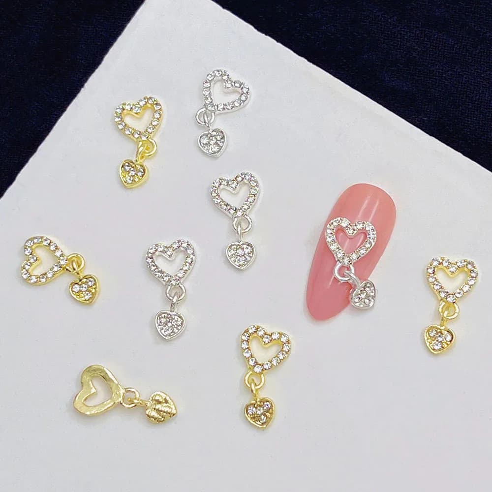 10 pièces coeur balancent ongles breloques 3D alliage luxe ongles strass argent or creux coeur ongle