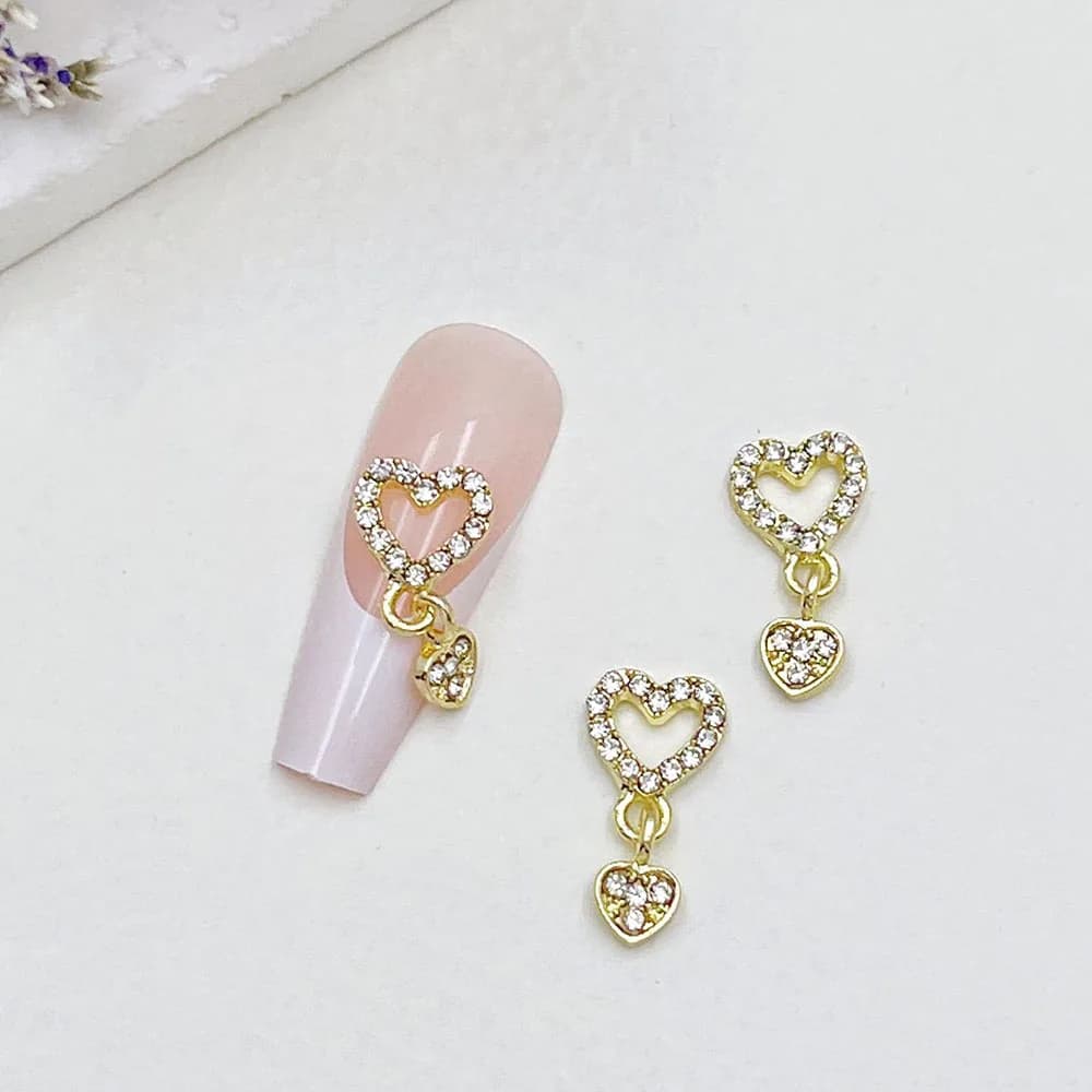 10 pièces coeur balancent ongles breloques 3D alliage luxe ongles strass argent or creux coeur ongle