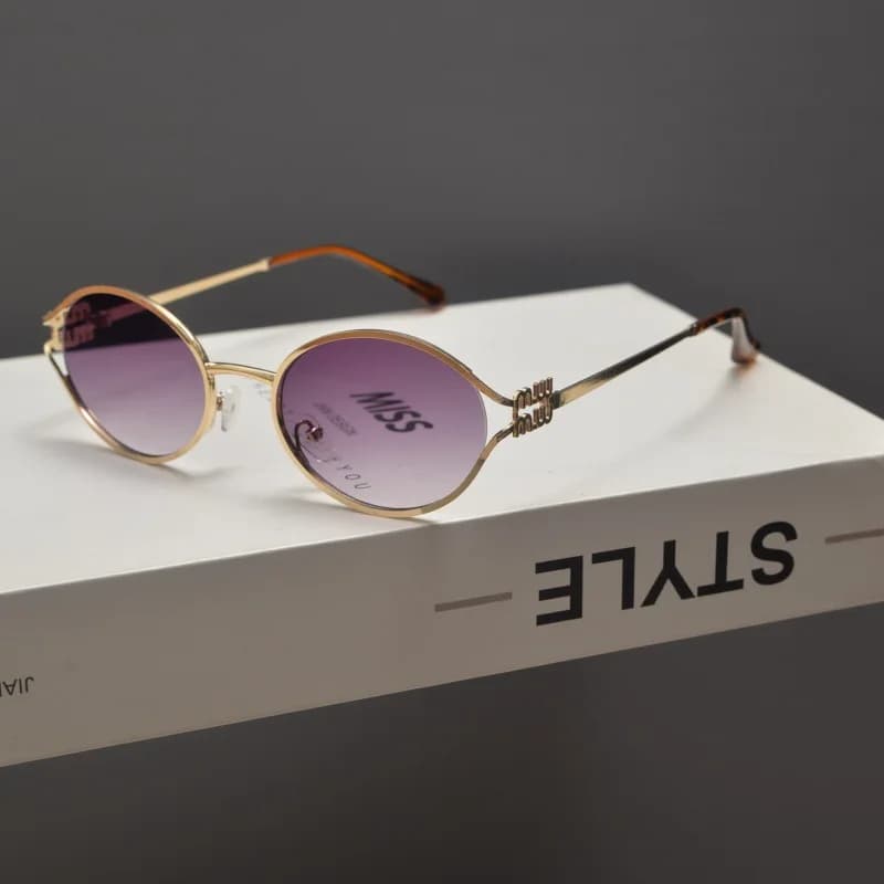 Nouvelle marque de mode lunettes de soleil ovales pour femmes rétro petit cadre femme homme métal lu