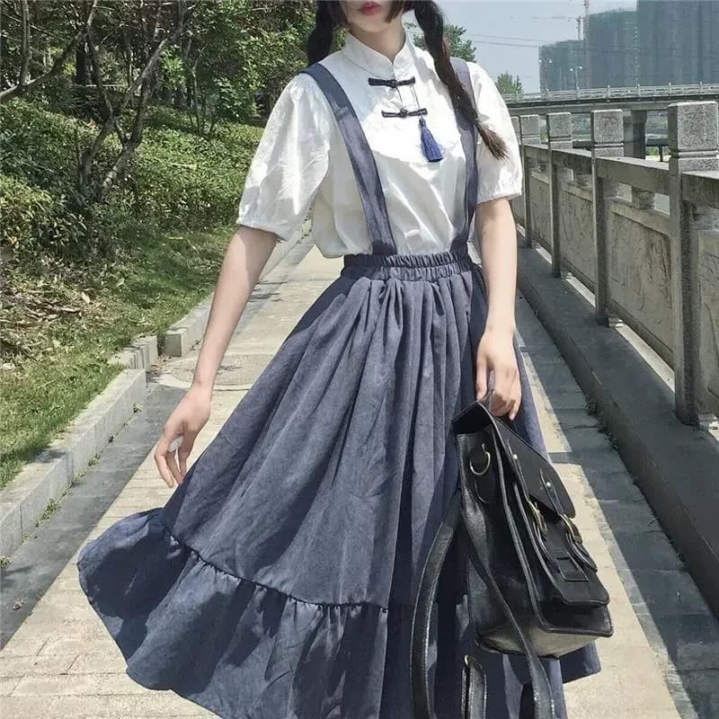 Nouveau doux femmes jupe Style Preppy sangle jupe longue volants ample mignon étudiant jupe décontra