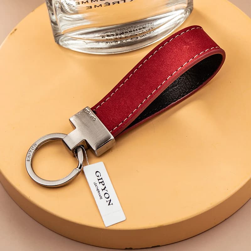 Corde de poignée exquise de haute qualité, pendentif de porte-clés Simple en peau de vache, anneau d