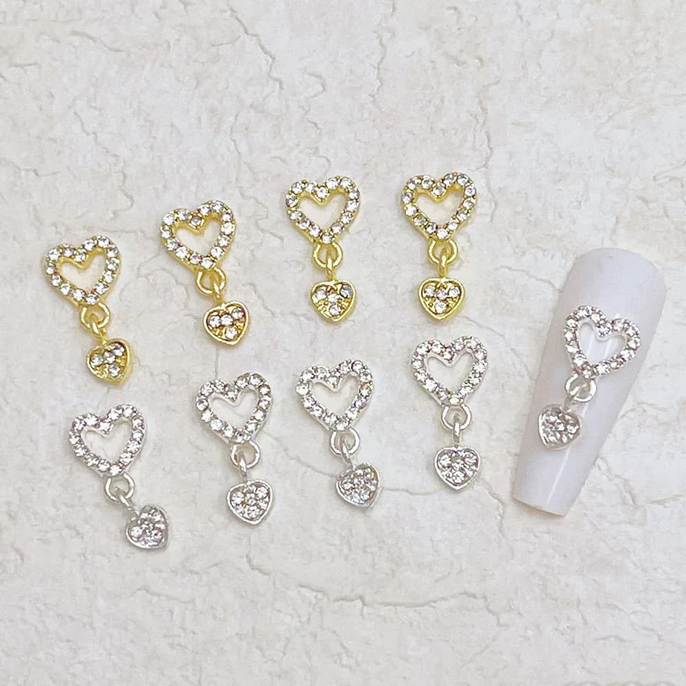 10 pièces coeur balancent ongles breloques 3D alliage luxe ongles strass argent or creux coeur ongle