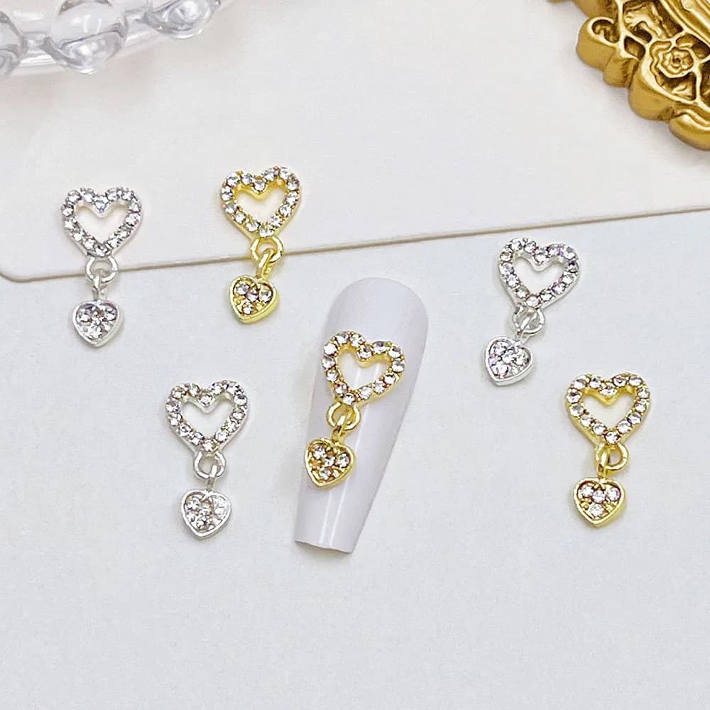 10 pièces coeur balancent ongles breloques 3D alliage luxe ongles strass argent or creux coeur ongle