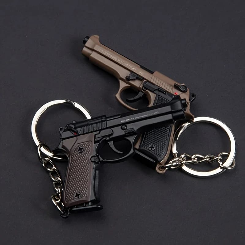 Porte-clés Pistolet Tactique 2025 - Modèle de Pistolet en Alliage 1:4 avec Pompons et Couvercle Tran