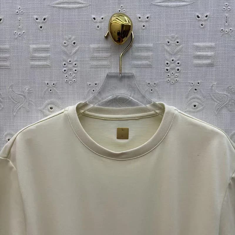 T-shirt asymétrique à col rond et manches courtes pour femme, orné de chaînes, décontracté et de hau