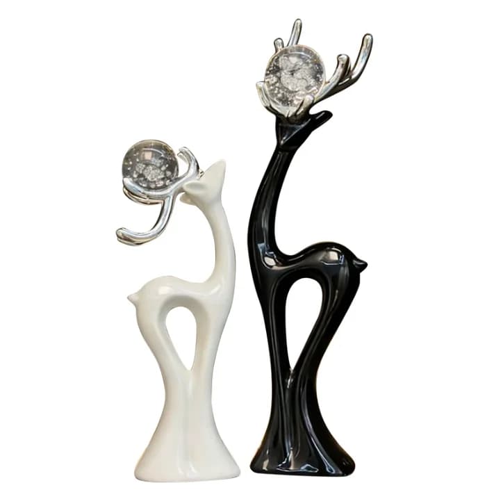 Une paire de cerfs noirs et blancs, une décoration minimaliste de style italien pour salon, meuble T