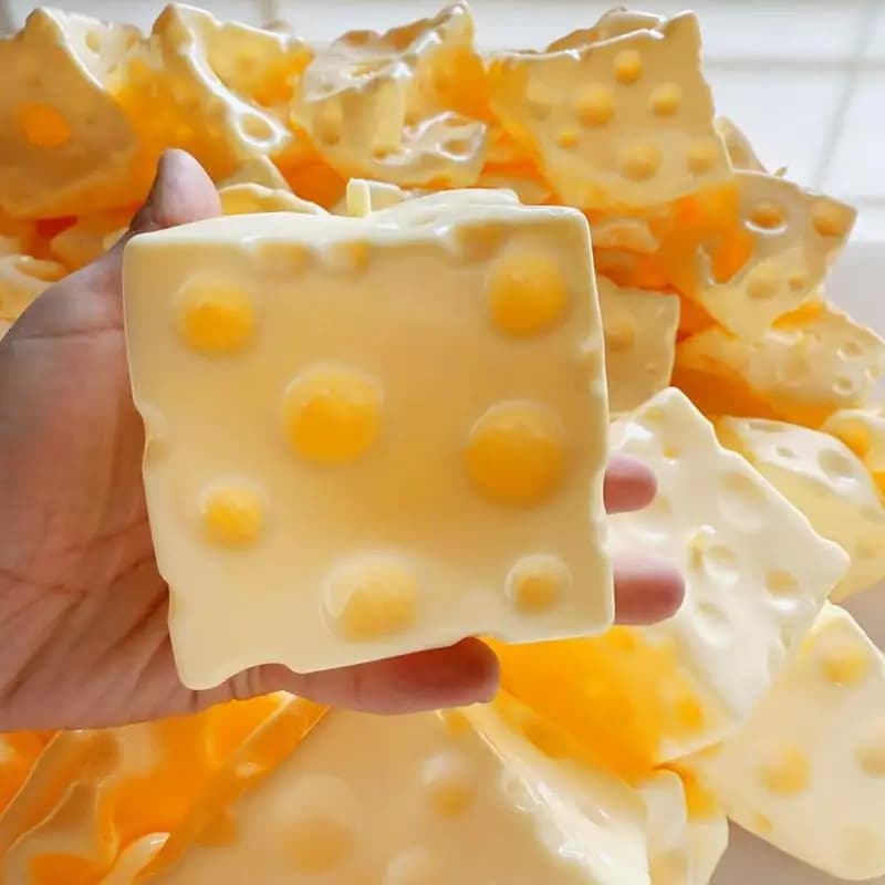 Balle anti-stress artisanale en plastique, en forme de boule de fromage à presser, à l'huile de coco