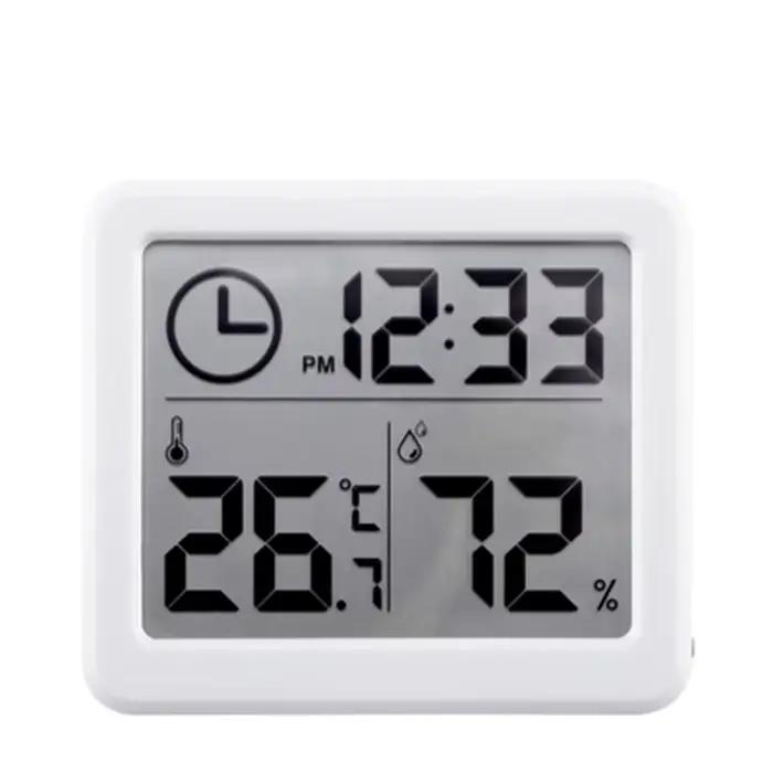 Horloge numérique de bureau avec affichage de la température et de l'humidité