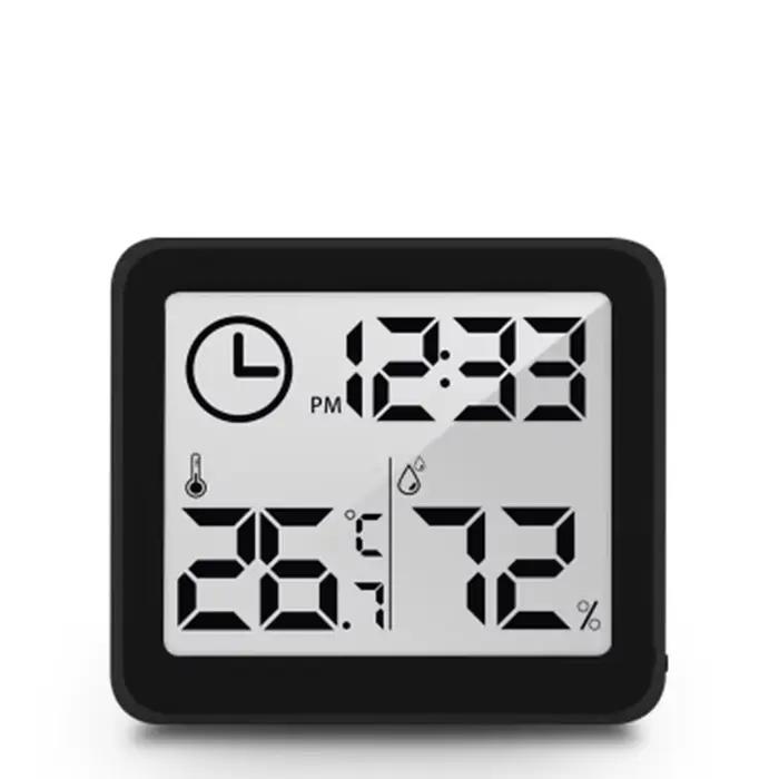 Horloge numérique de bureau avec affichage de la température et de l'humidité